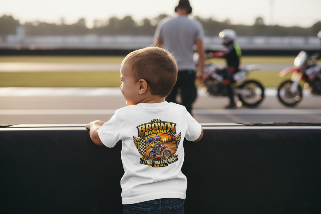 Toddler wearing the Brown Bananas T-shirt with the logo on the back
